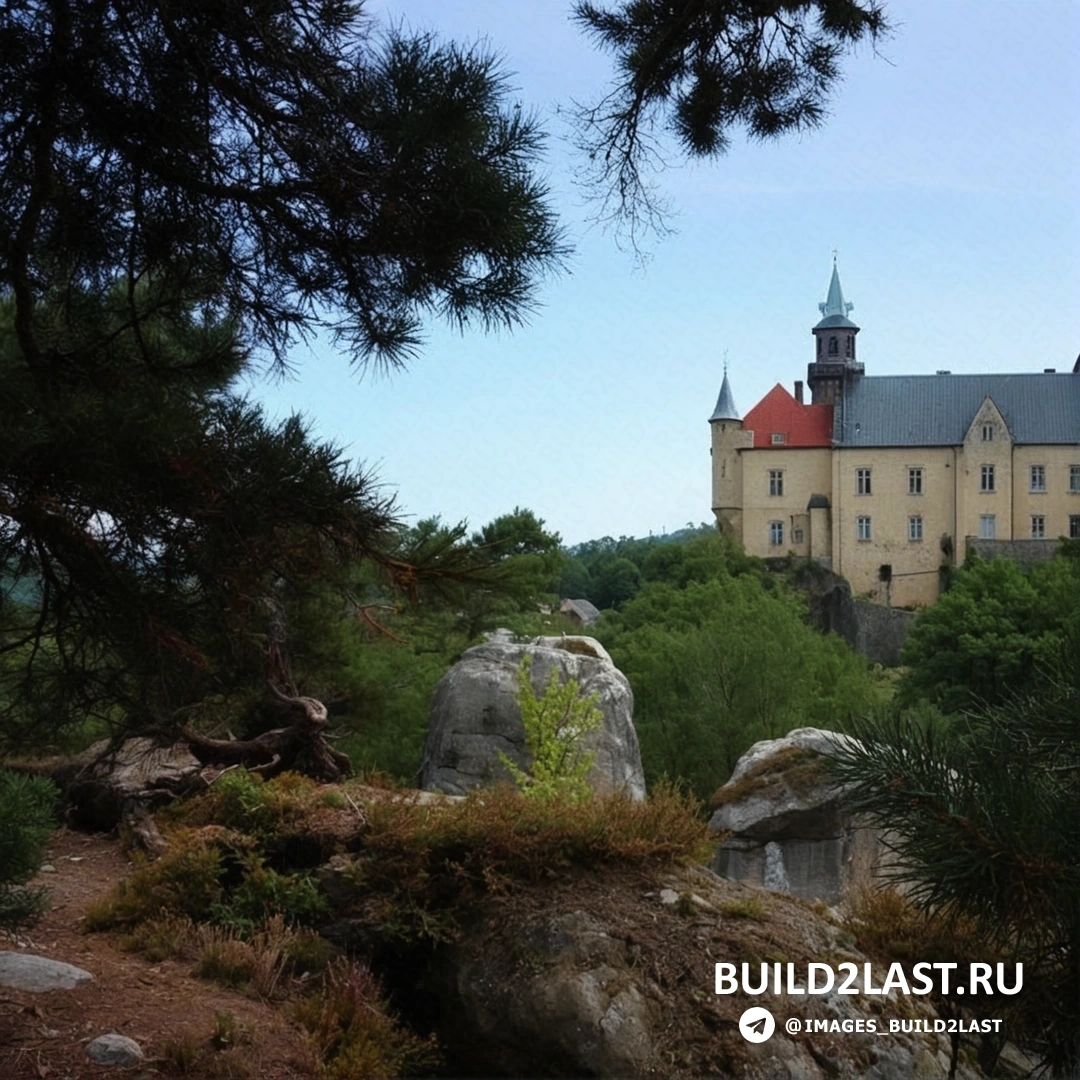 Замок Груба Скала в Турнове, Чехия, окружённый горами и черепичными крышами